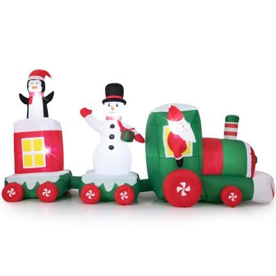 Inflatable Christmas train featuring Santa, a snowman with a gift box, and a penguin, perfect for outdoor holiday.