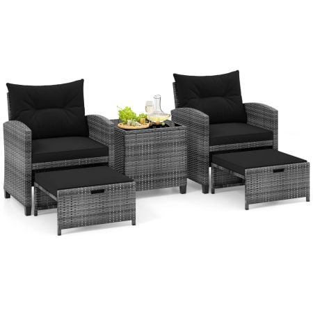 5-piece wicker patio furniture set featuring 2 cushioned chairs, 2 ottomans, and a tempered glass coffee table for outdoor relaxation.