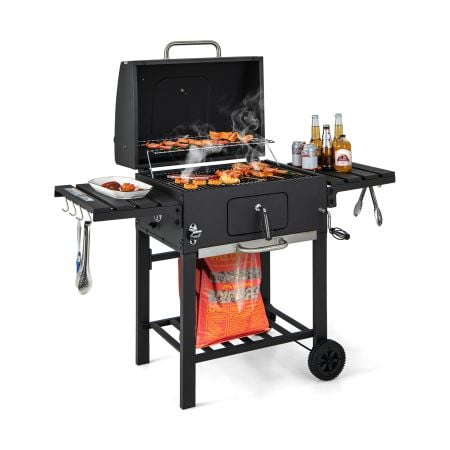 Charcoal BBQ grill with foldable side tables, hooks, and wheels, featuring a large cooking area for outdoor gatherings.