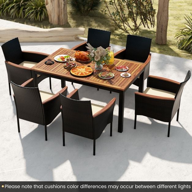 7-piece PE rattan outdoor patio dining set with acacia wood table and cushioned chairs, perfect for garden or poolside. 7-piece PE rattan outdoor patio dining set with acacia wood table and cushioned chairs, perfect for garden or poolside.