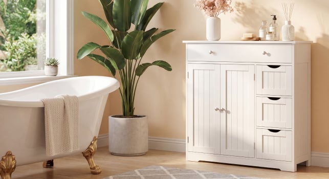 white floor cabinet in bathroom