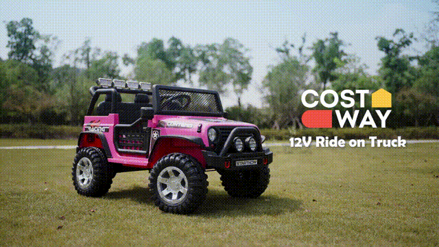 Pink kids electric truck on the grass